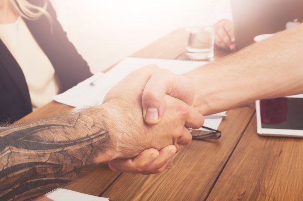 Business handshake at office meeting, contract conclusion and successful agreement Business handshake at office meeting, contract conclusion and successful agreement
