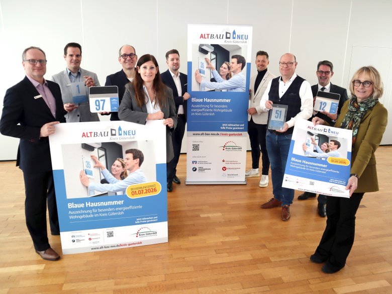 Ansprechpersonen vom Kreis und den regionalen Partnern im Kreishaus Wiedenbrück.