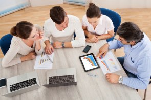 Business Team In Office Meeting Business Team In Office Meeting