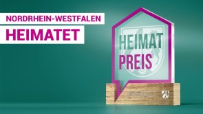 Grafik mit der Aufschrift "Nordrhein-Westfalen heimatet"